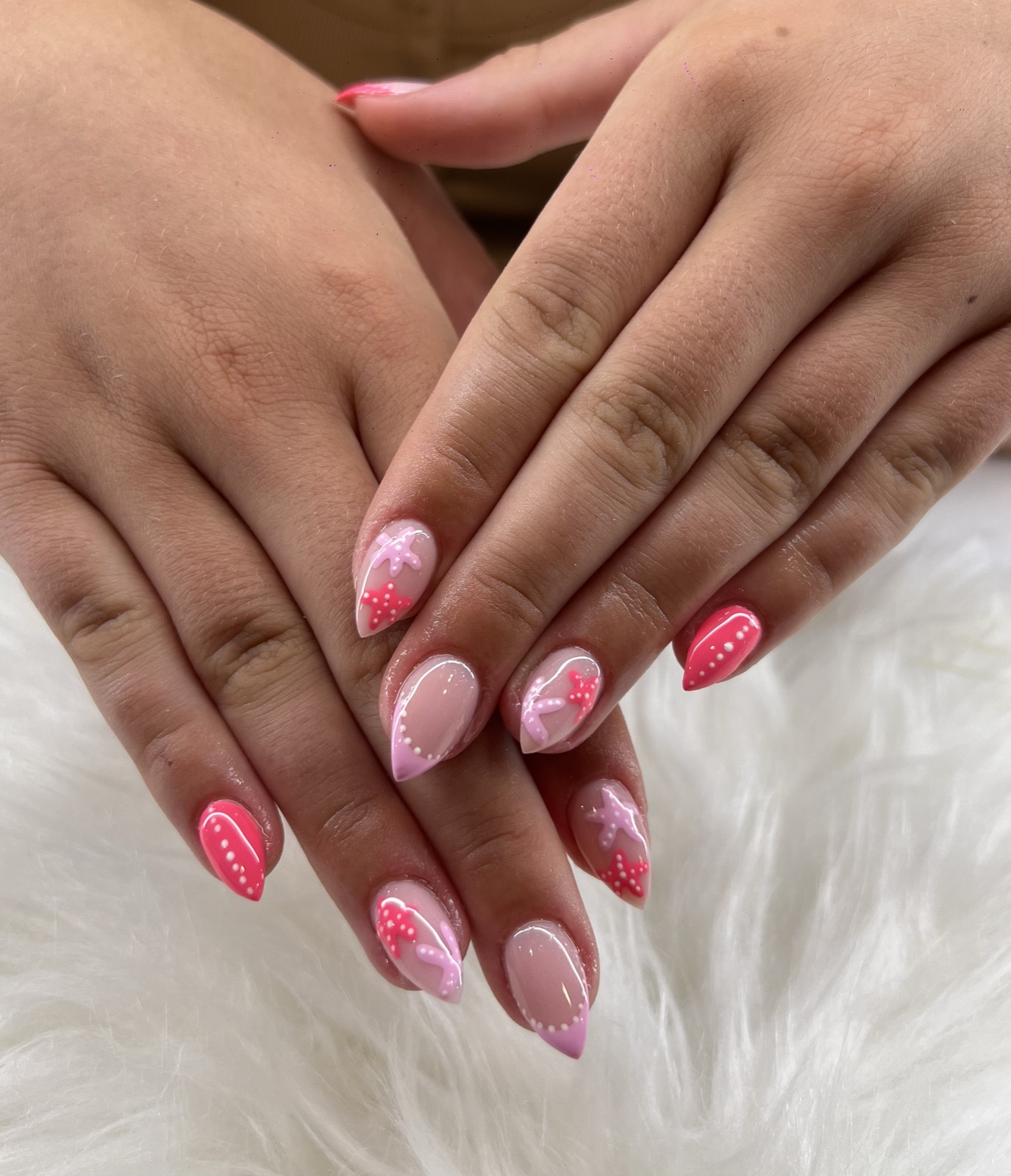 Pink nails with bow and pearl detail