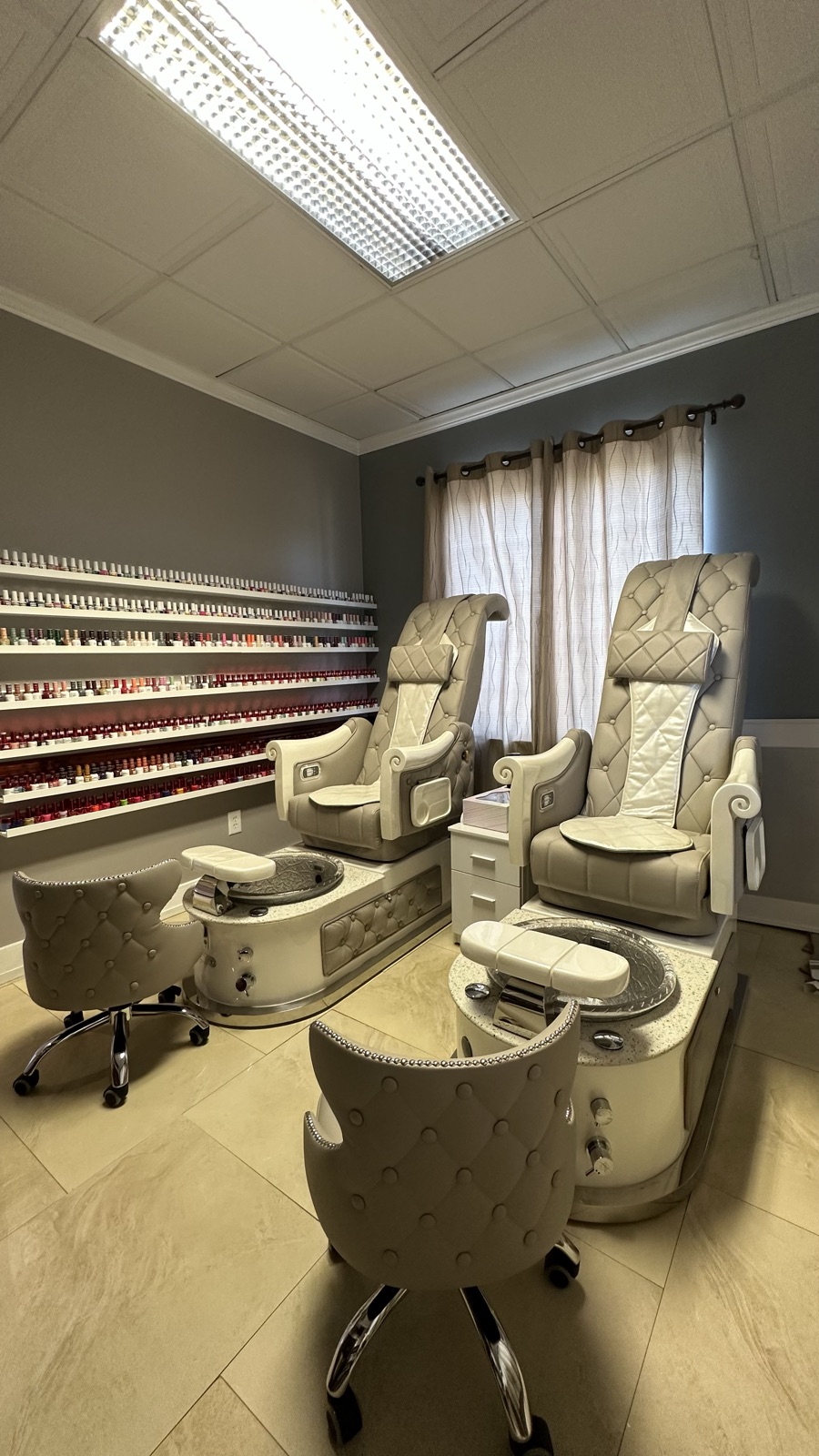 VIP pedicure room with full polish wall